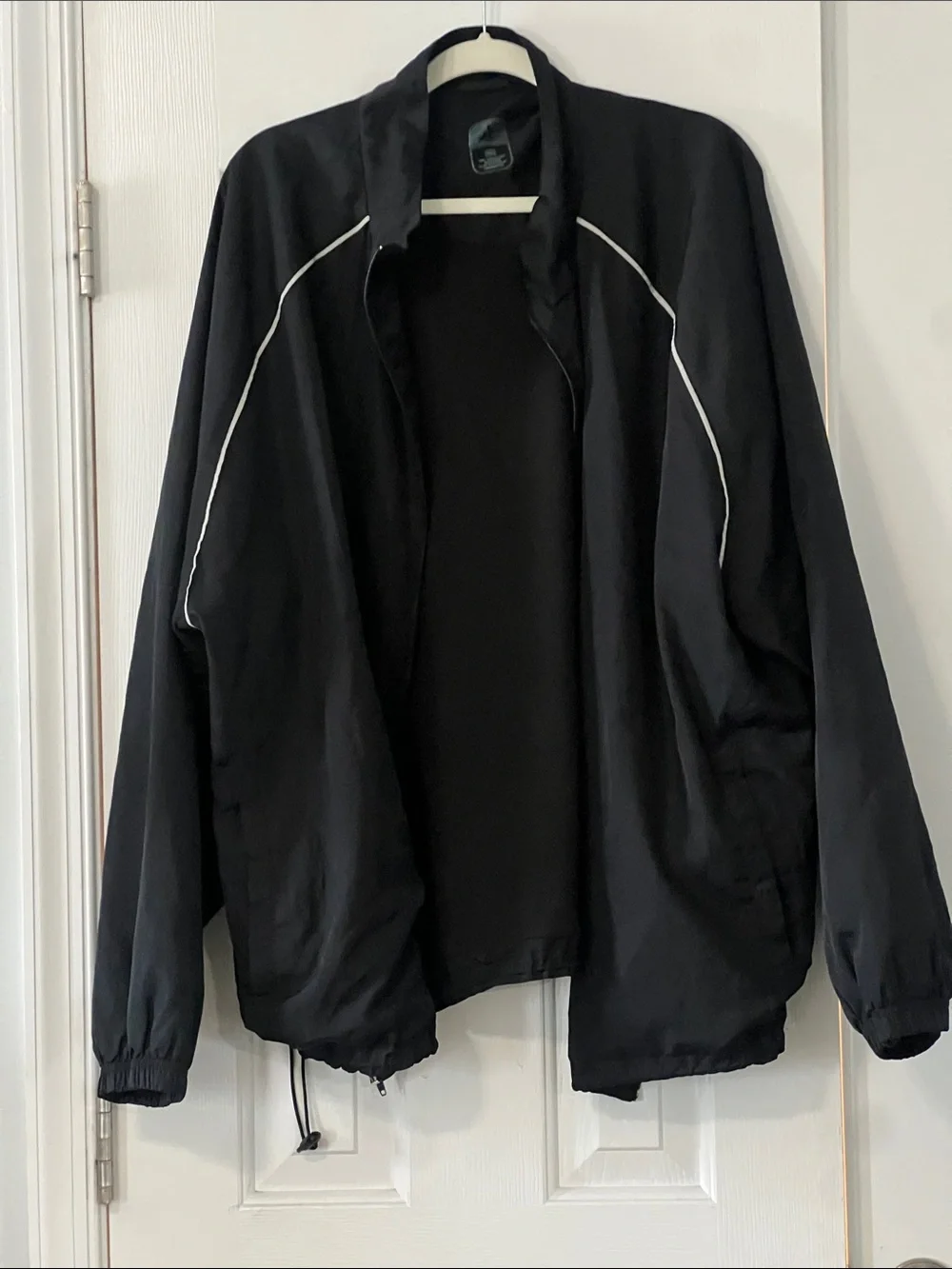 Alphalete Black Windbreaker with White Piping Accents